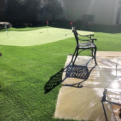 Private Backyard with Installed Putting Greens