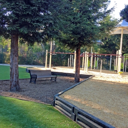 Public park playground artificial grass installation synthetic turf lawn grass sand playgrounds surface ambrellas