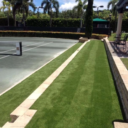 tennis court artificial grass installation, tennis ideas, green carpet outdoor, palm trees blue sky, concrete surface, stone