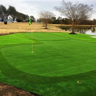Putting Greens private golf practice on the lake Raleigh NC. Compare natural grass artificial turf putting green.