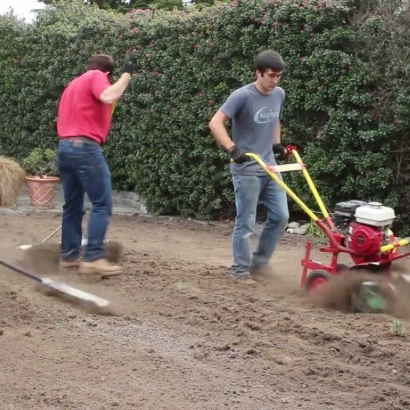 Removing soil before synthetic grass installation