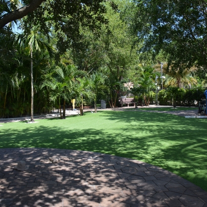 Synthetic lawn artificial grass turf lawn forest backyard landscaping ideas trees.