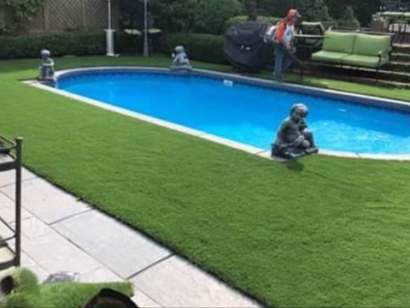 Artificial Grass Installed Over Concrete Around Swimming Pool