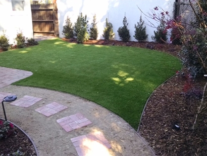 Artificial grass installation pavers stepping stones walkway synthetic turf backyard landscaping lawn landscape