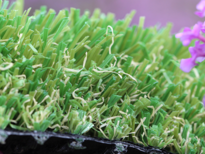 Safe synthetic grass with Soft cushioning blades.