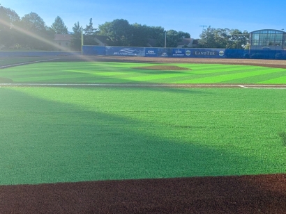 Closeup view of artificial turf on a baseball field.